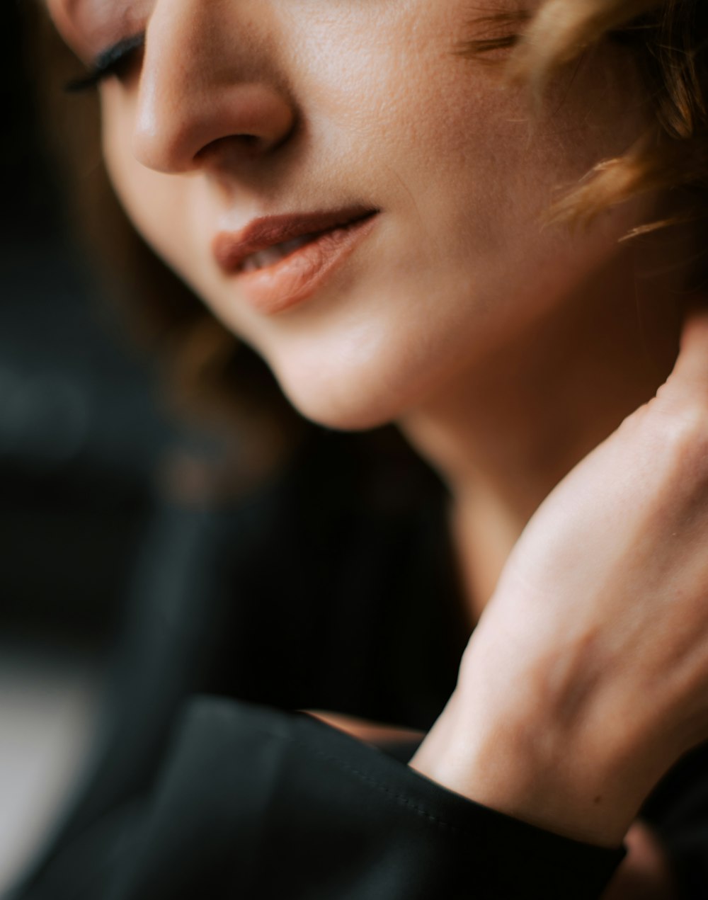 a close up of a person wearing a ring