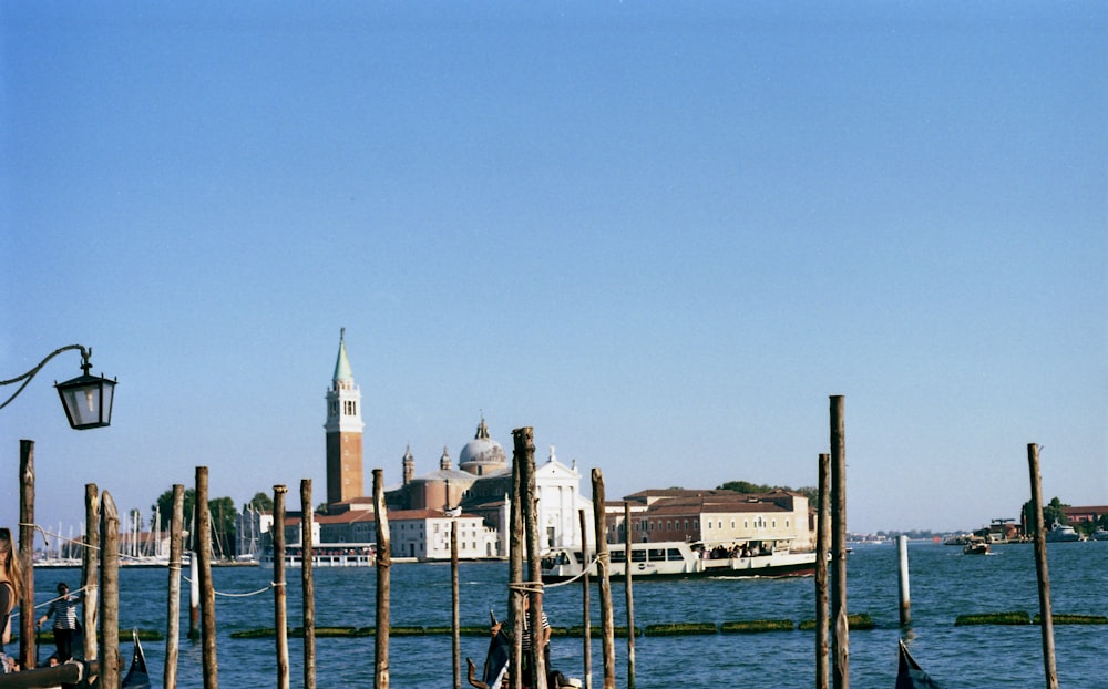 a view of a body of water with buildings in the background