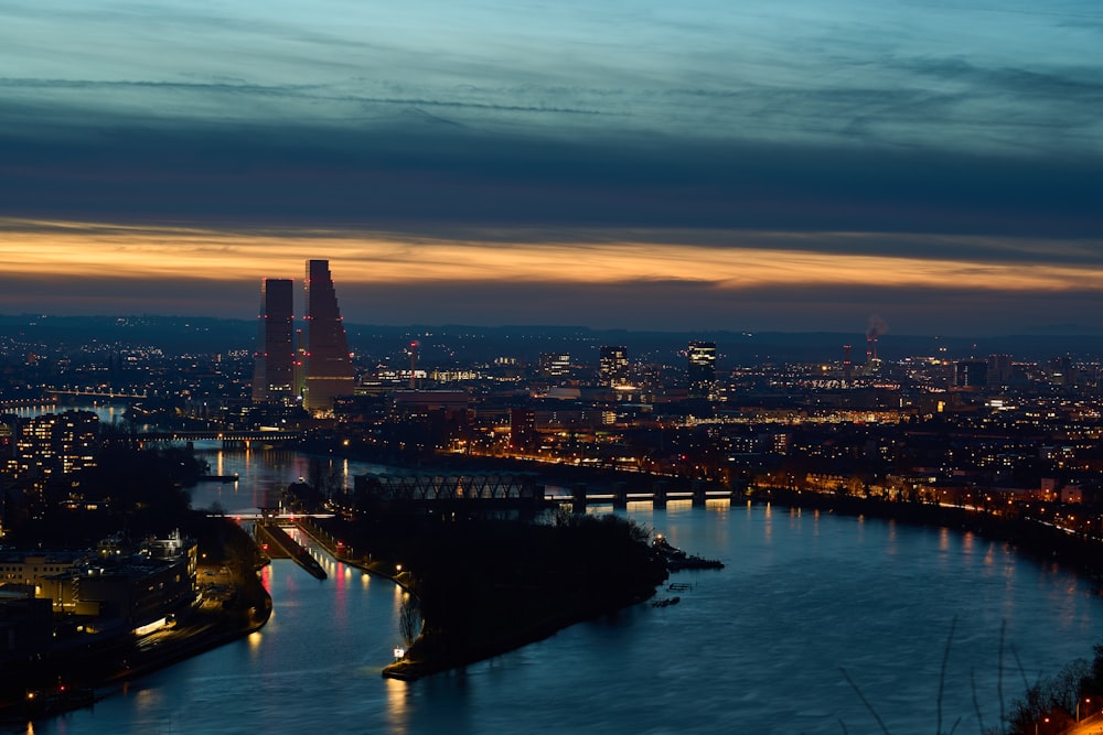 a view of a river and a city at night