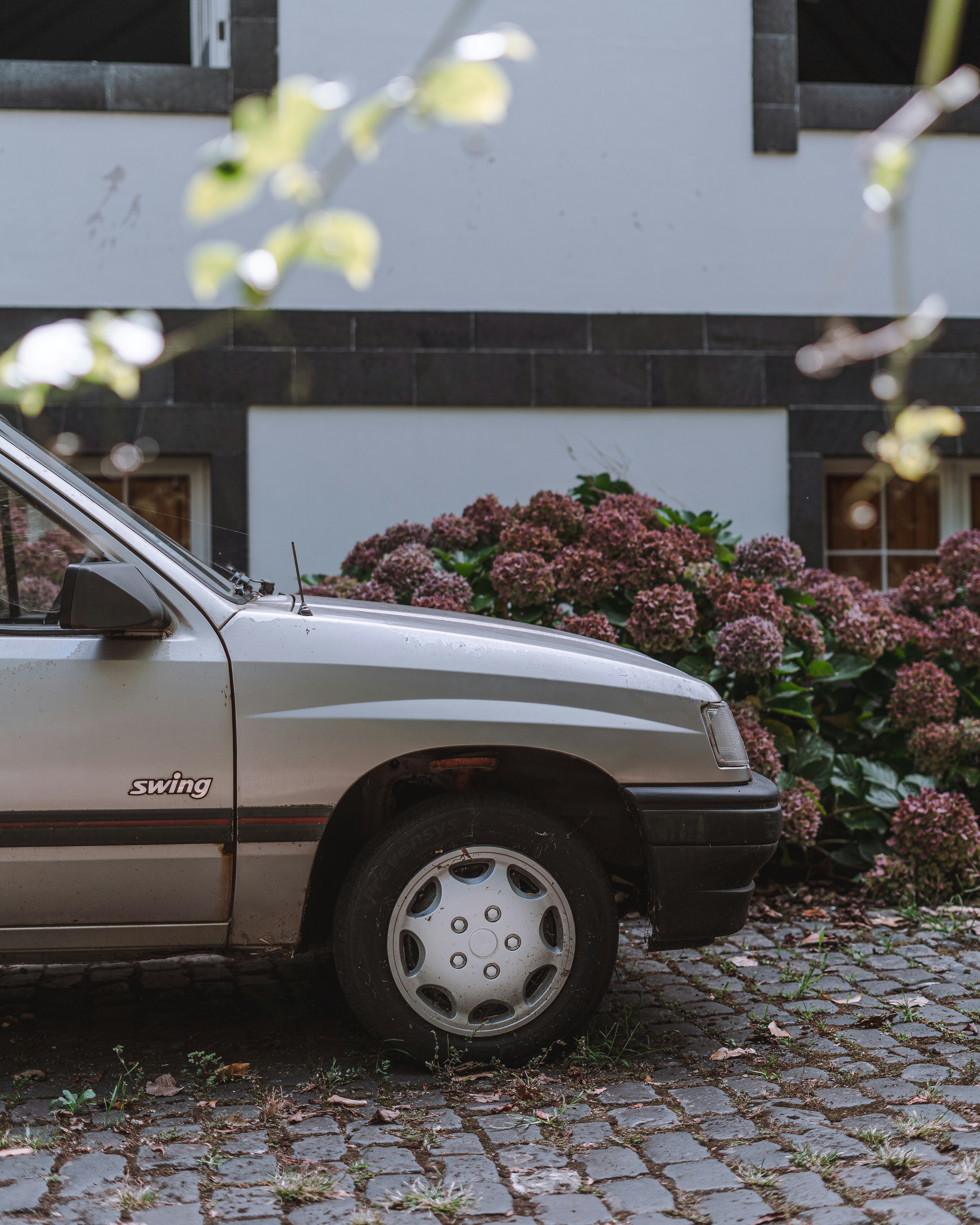 a car parked in front of a house