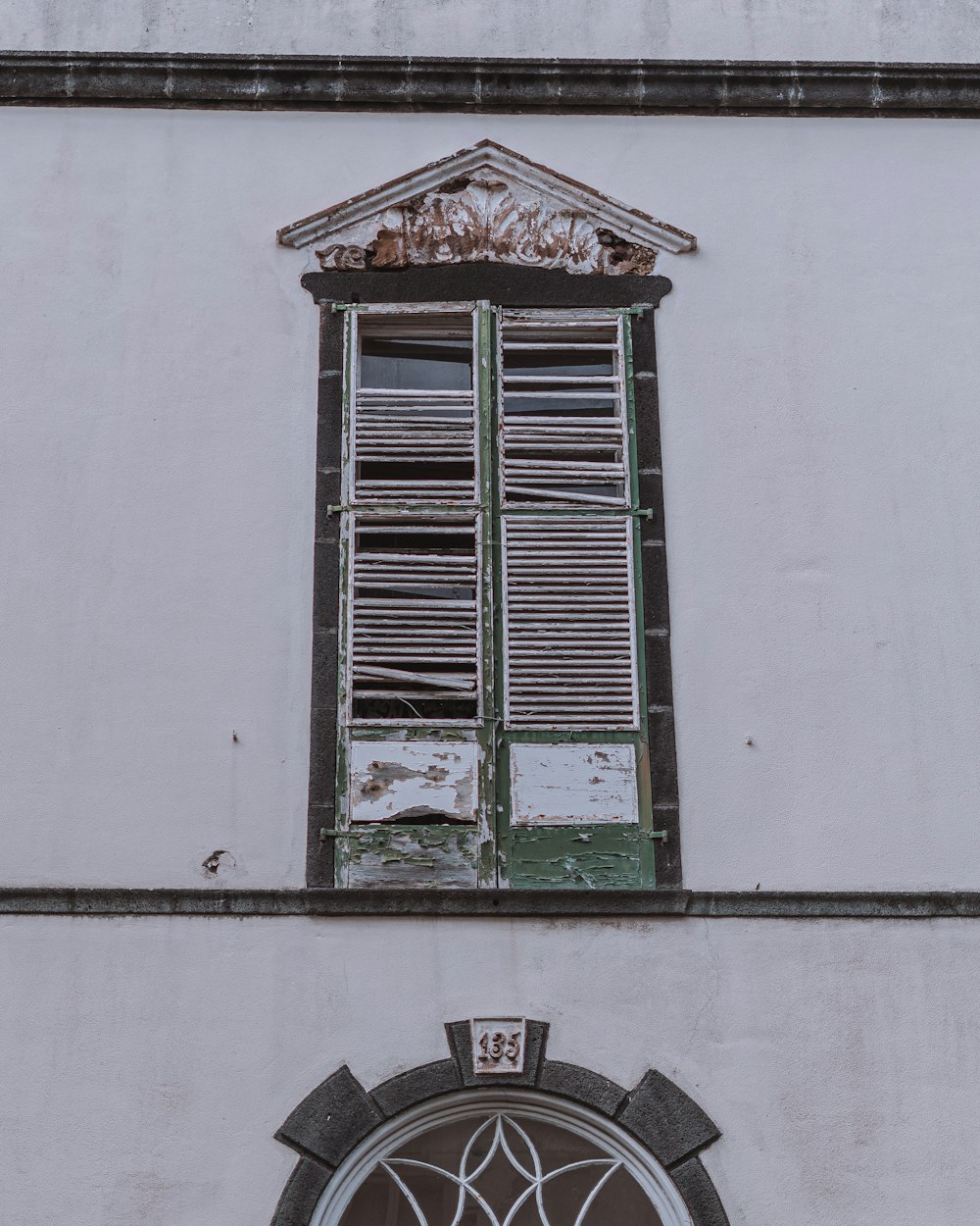 a building with a window and a round window