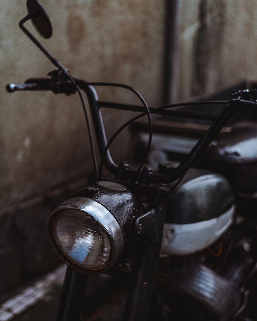 a close up of a motorcycle parked in a building