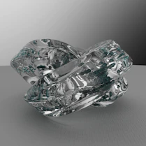 a glass sculpture sitting on top of a table