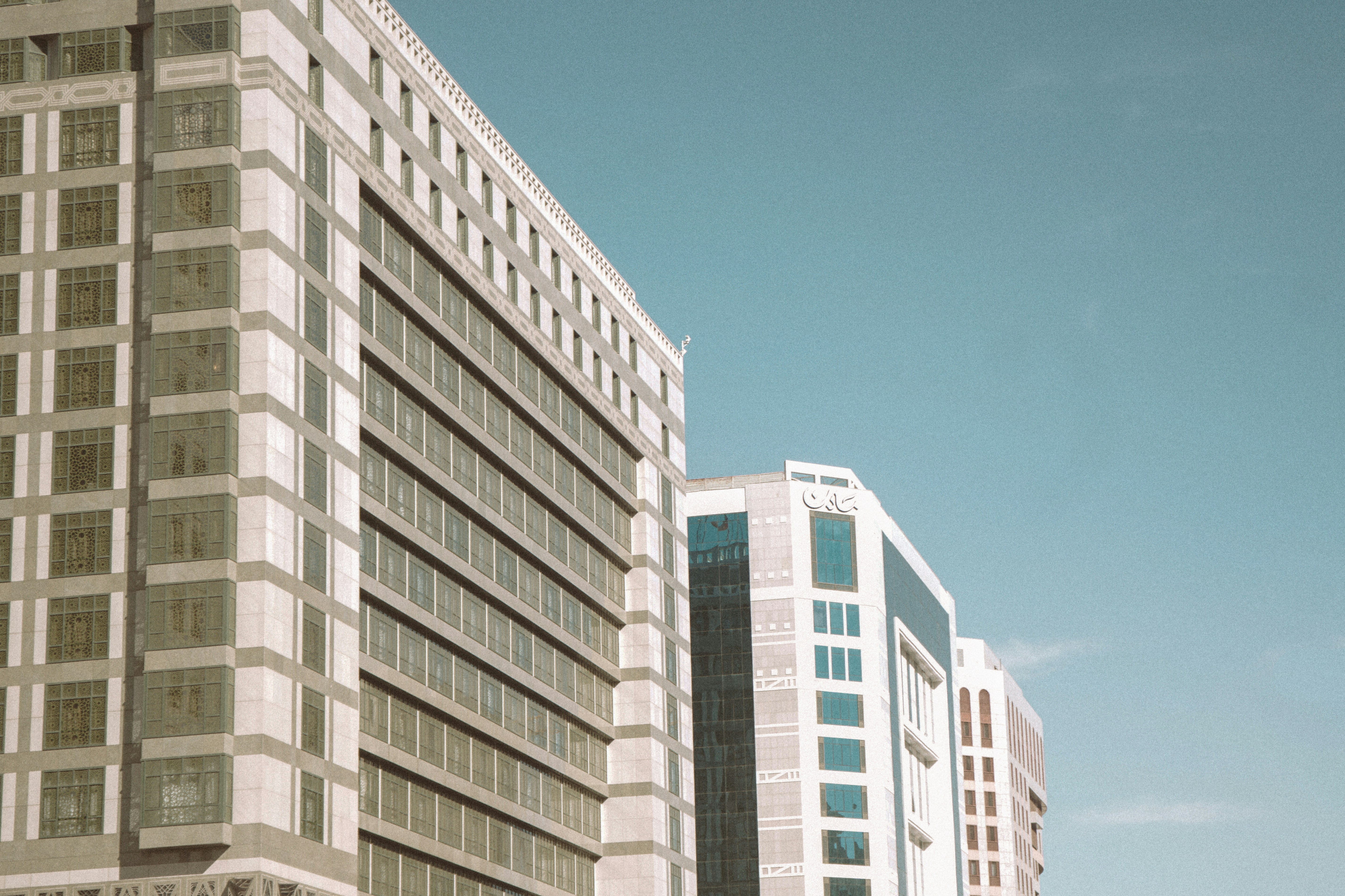 a tall building with a clock on the top of it