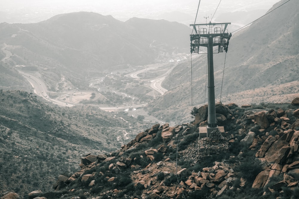 a cable car going up a mountain side