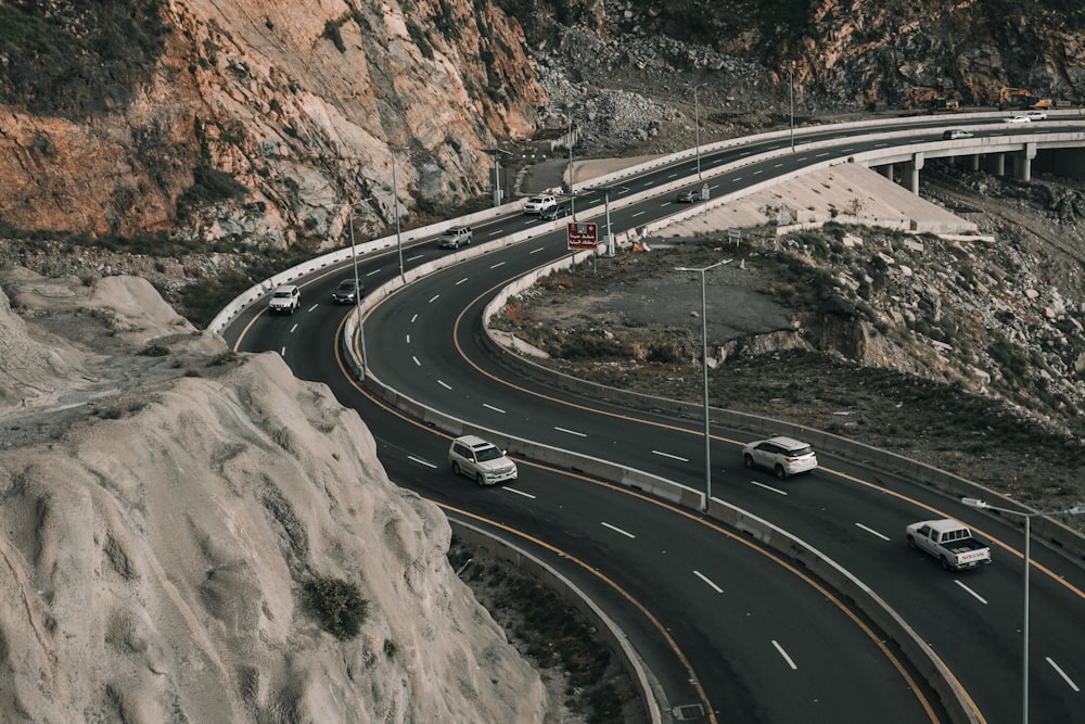 a view of a highway with cars driving on it