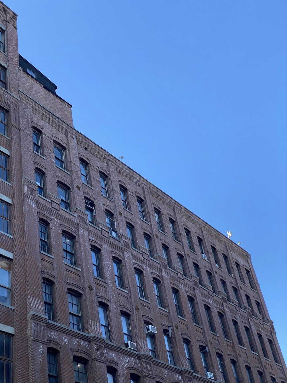 a very tall building with lots of windows