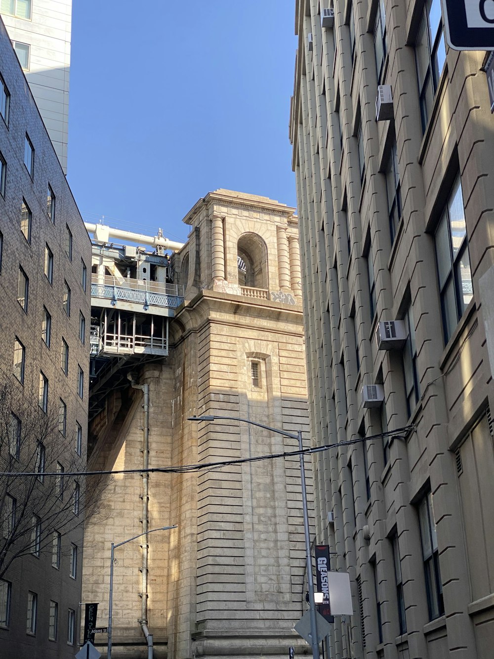 a very tall tower with a clock on it's side