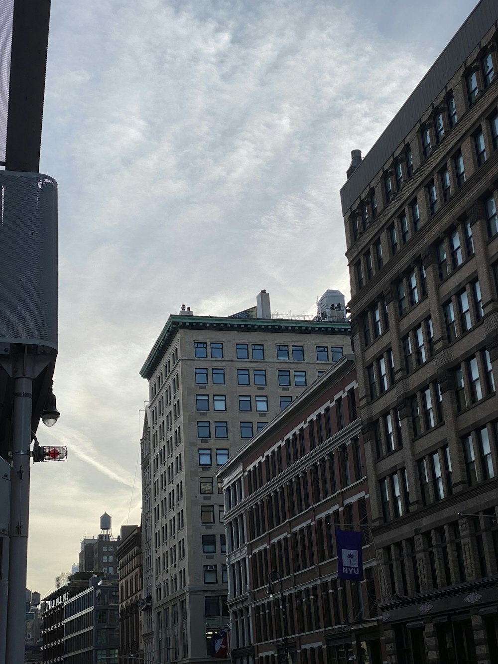 a city street filled with lots of tall buildings