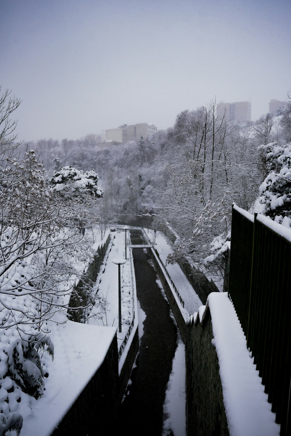 a train traveling through a snow covered countryside