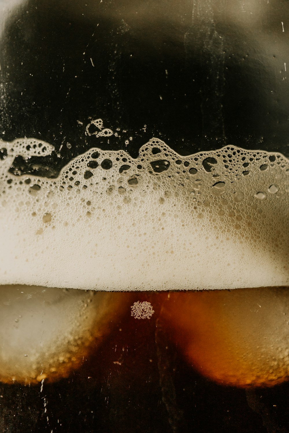 a close up of a glass of beer