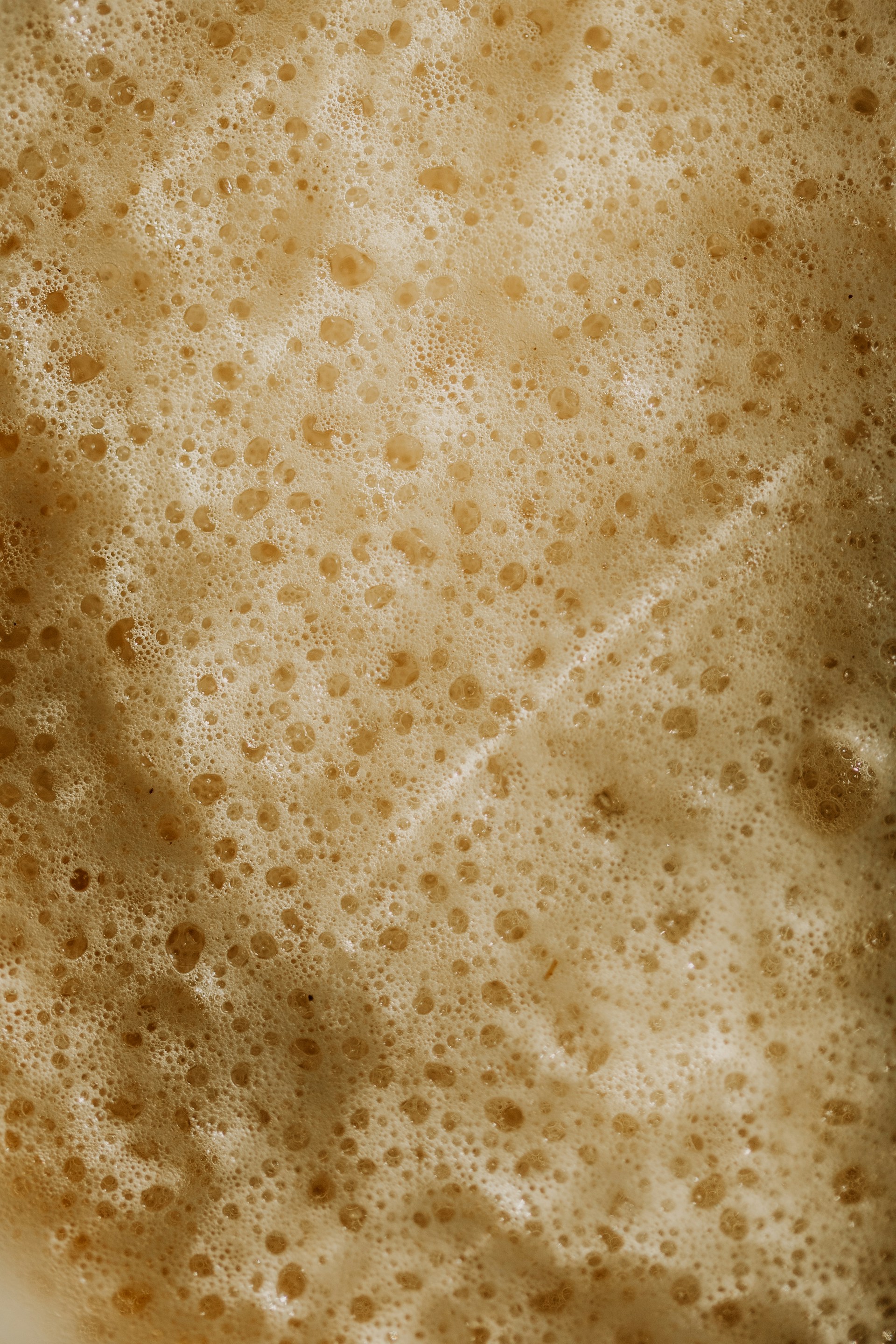 a cup of coffee with a spoon in it