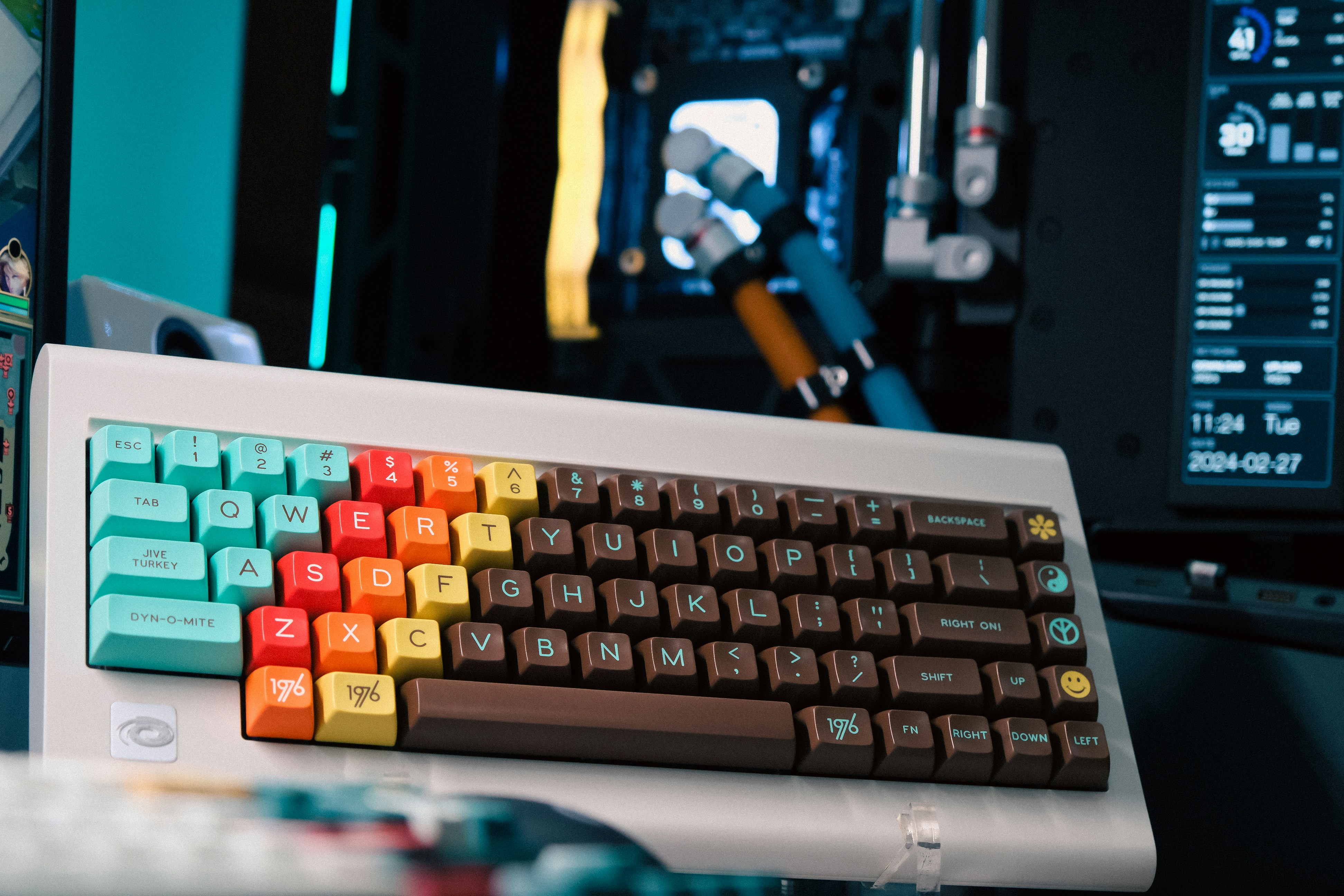 a computer keyboard sitting on top of a desk