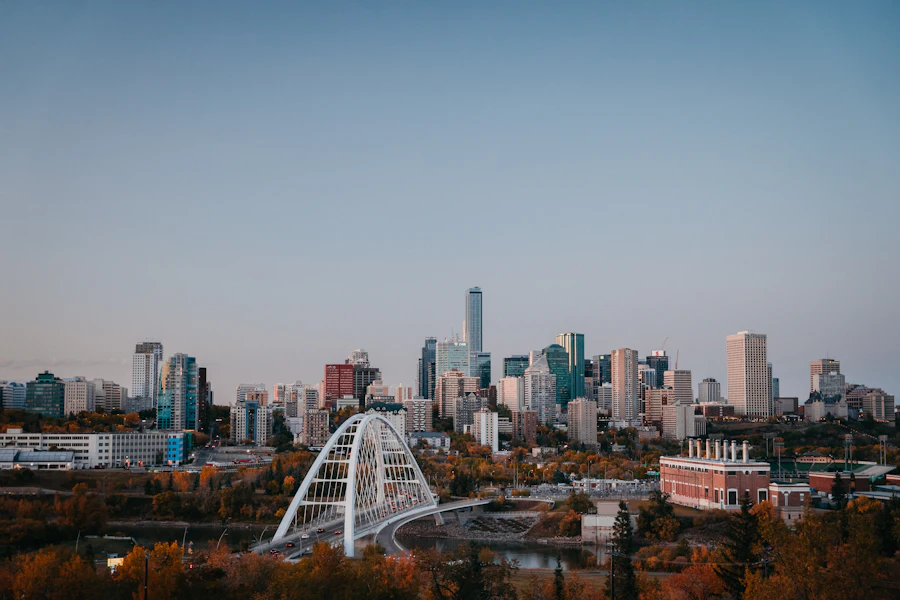 Edmonton downtown skyline at golden hour with a bridge in the foreground
