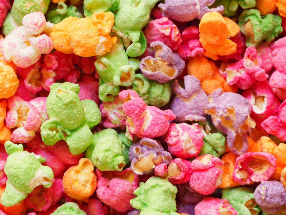 a close up of a pile of colorful popcorn