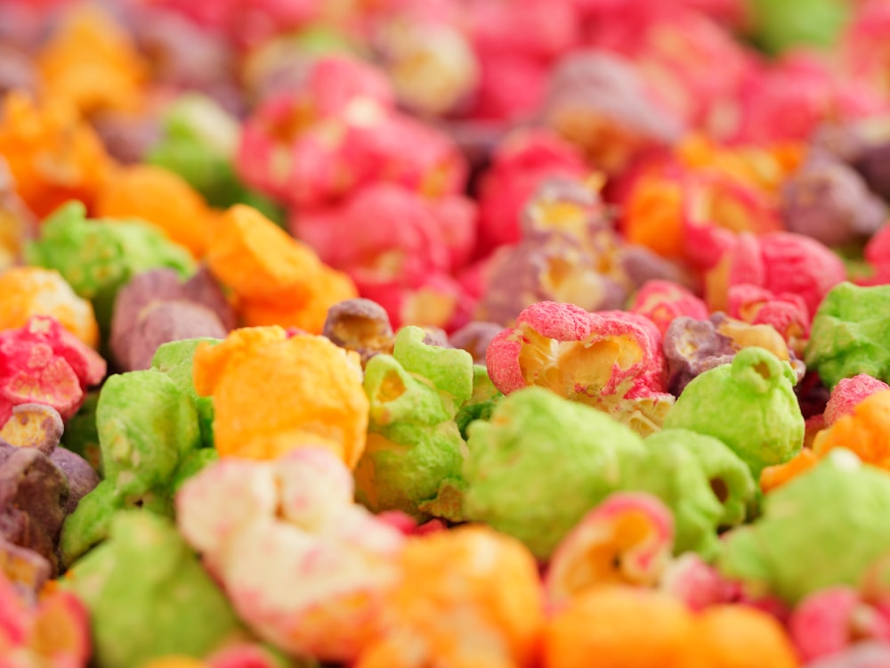 a close up of a pile of colorful popcorn
