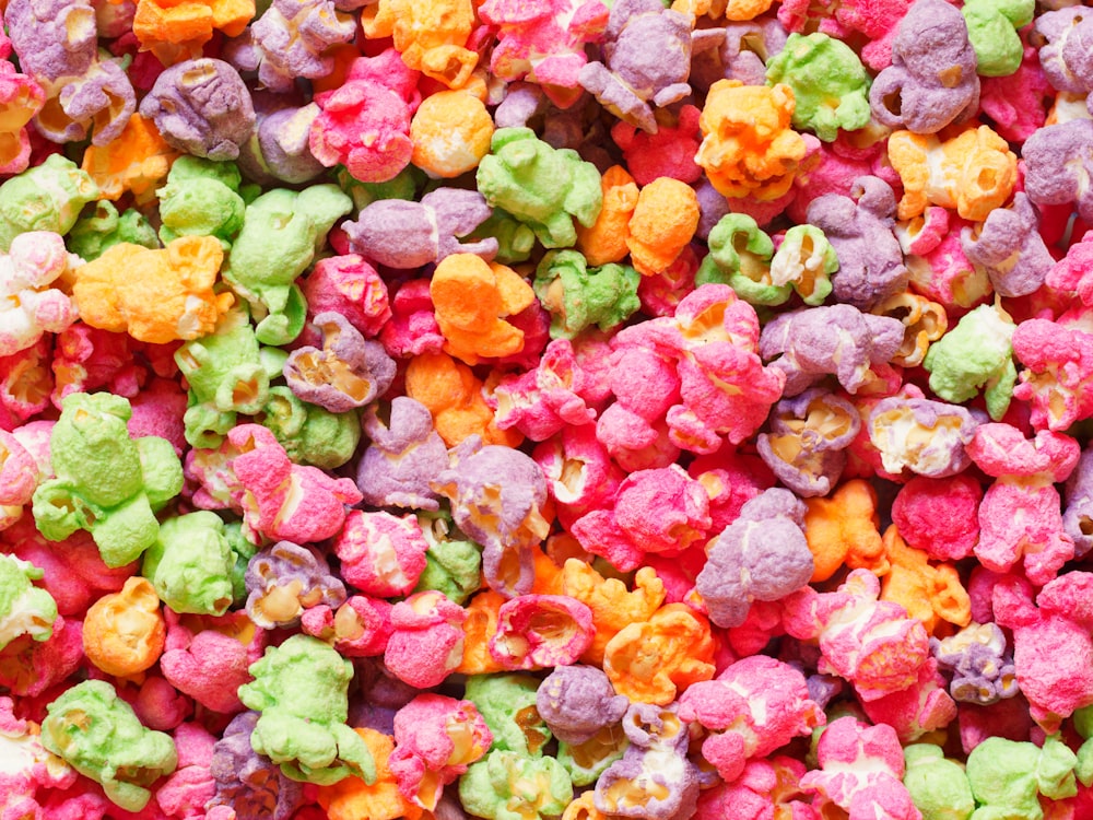 a close up of a pile of colorful popcorn