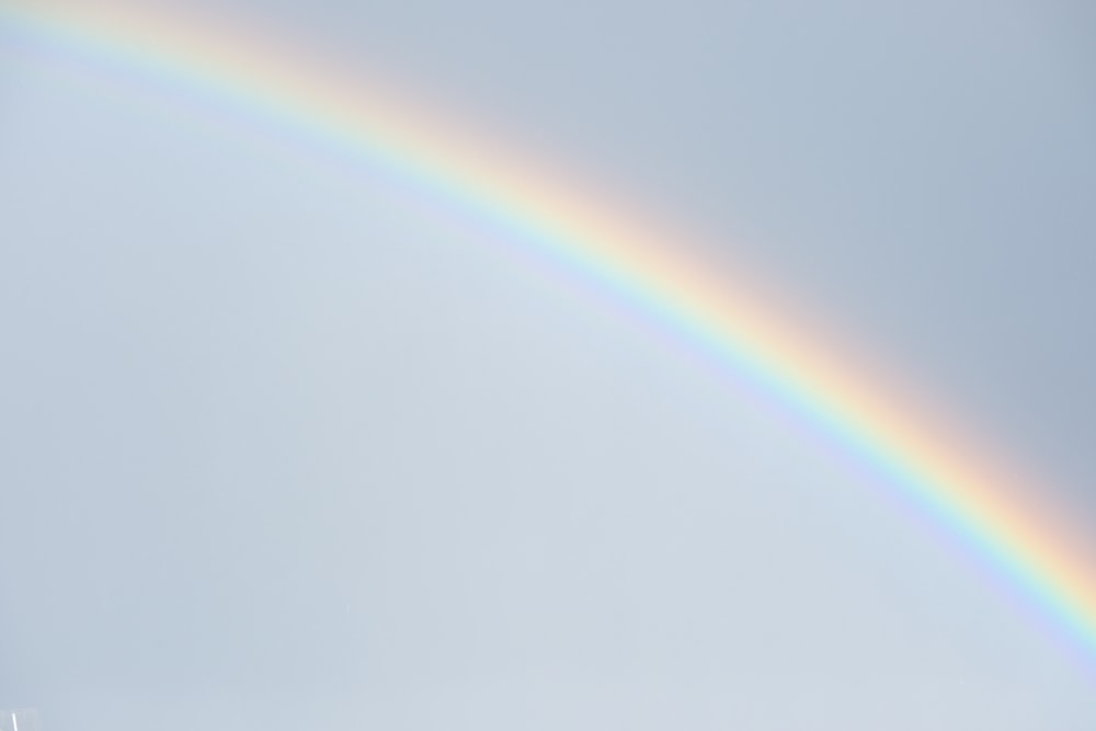 a double rainbow is seen in the sky