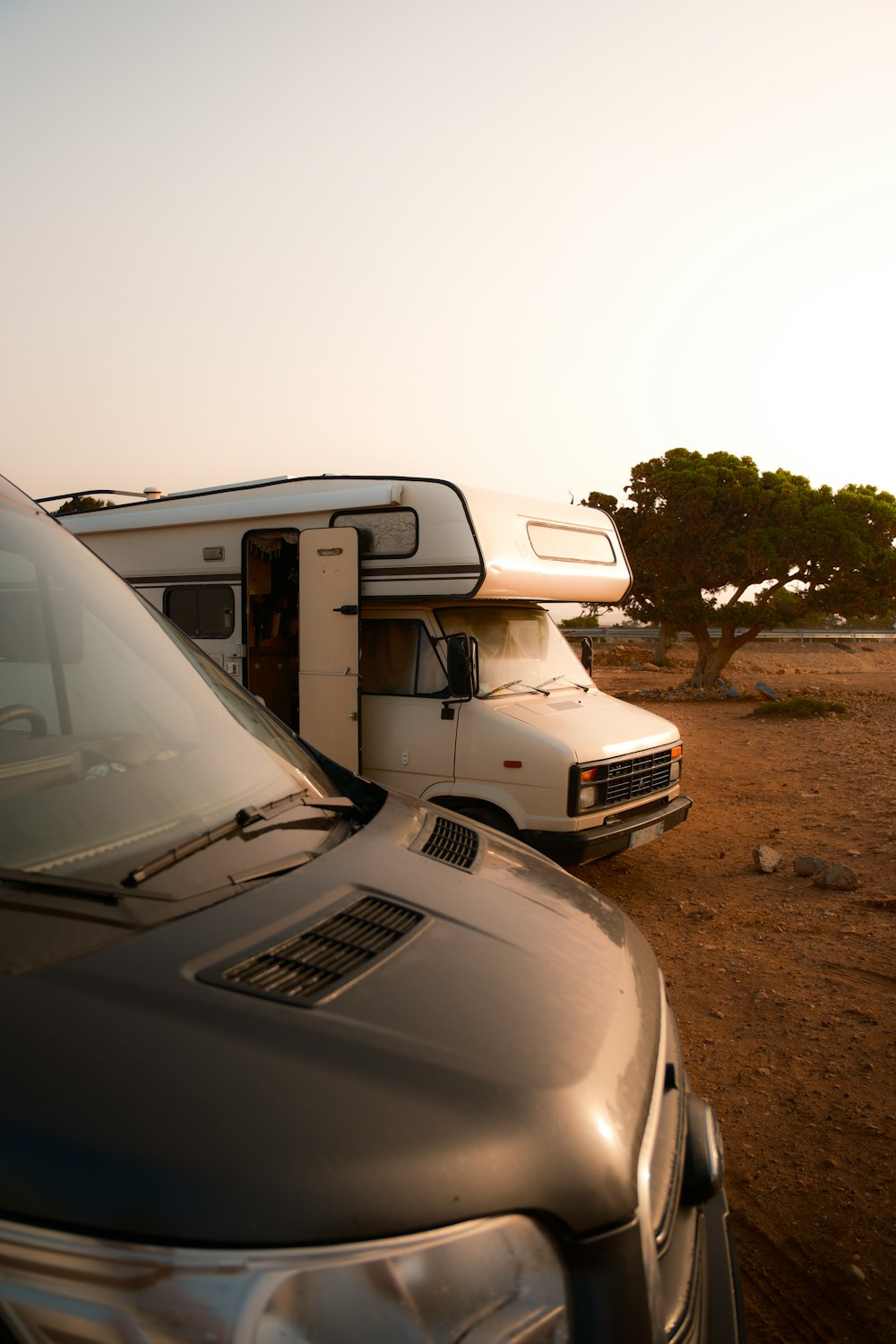 a couple of cars parked next to each other