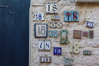 a wall with numbers and numbers on it