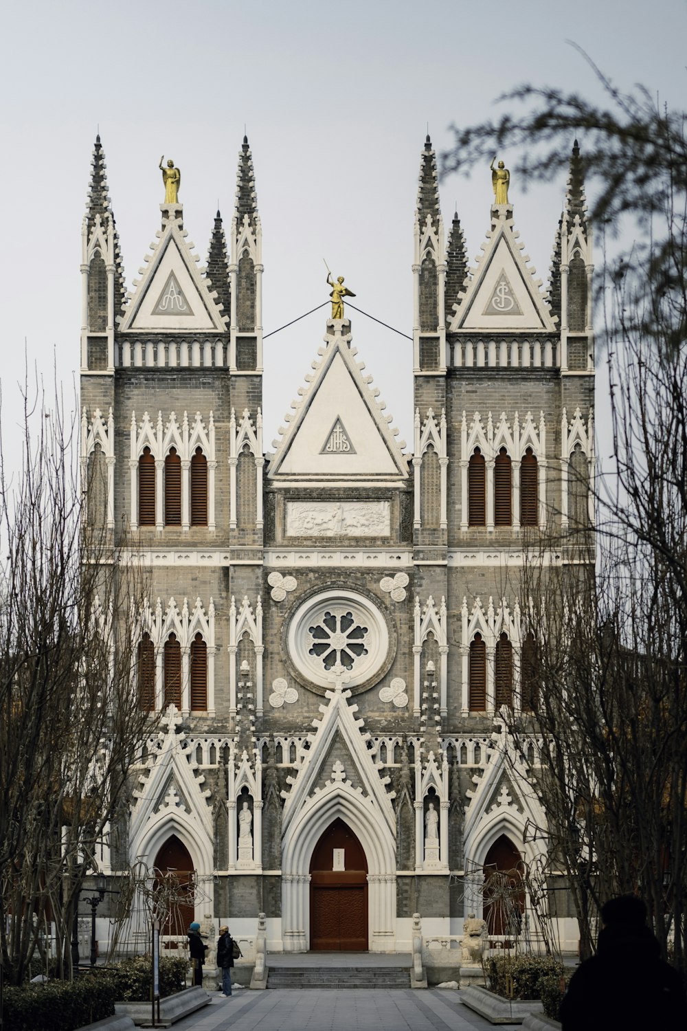 a large cathedral with a clock on the front of it