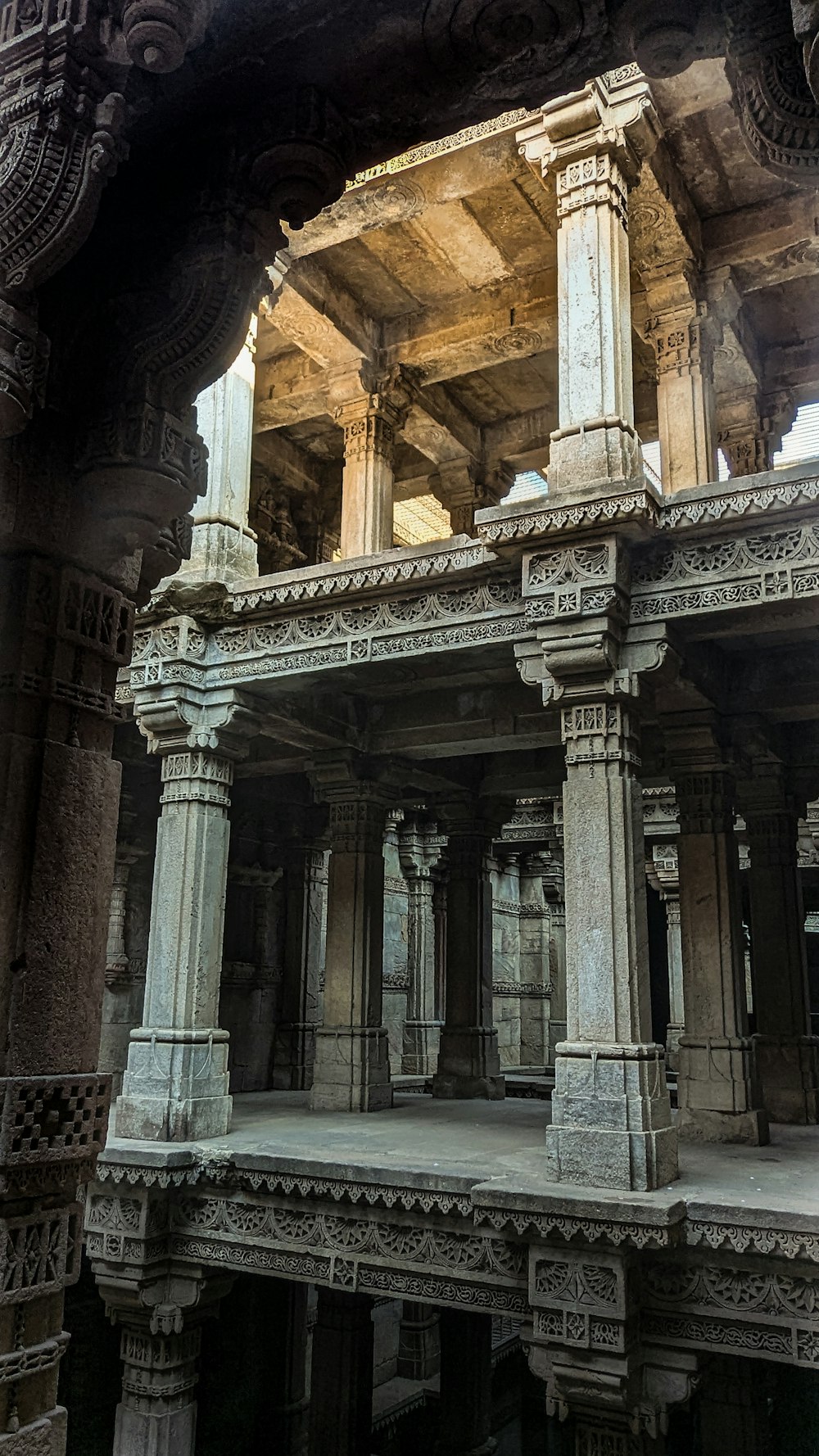 a large building with pillars and pillars inside of it