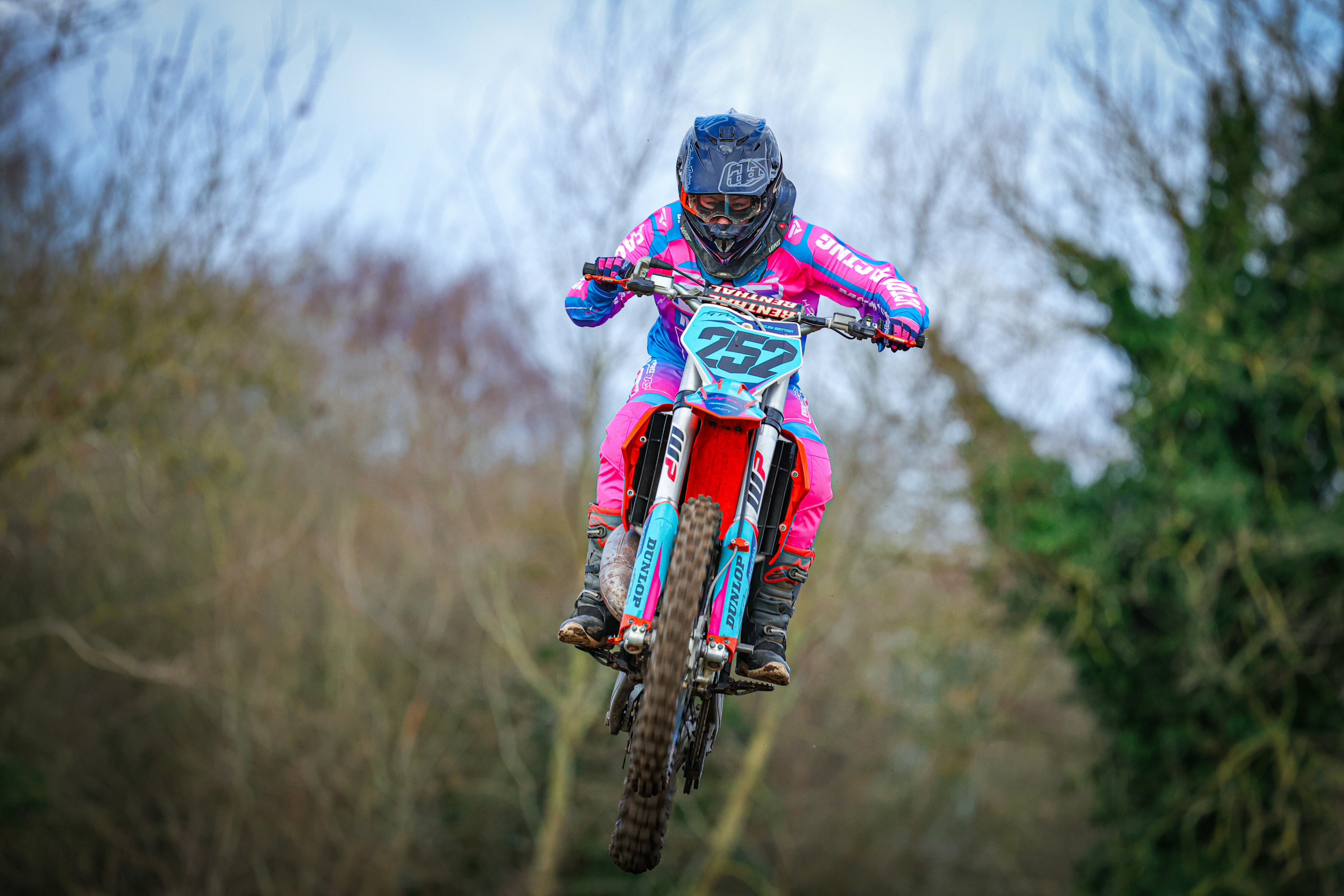 a person on a dirt bike in the air