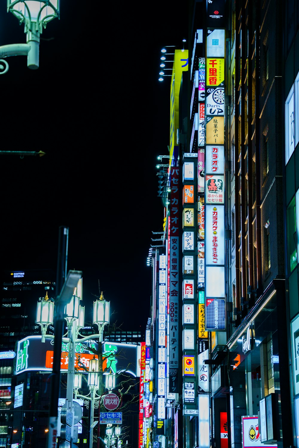 a city street filled with lots of tall buildings