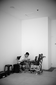 a man sitting at a desk in a room