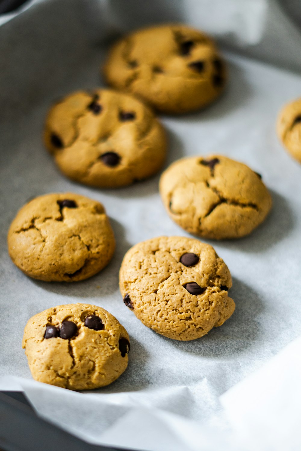 a bunch of cookies sitting on top of a pan