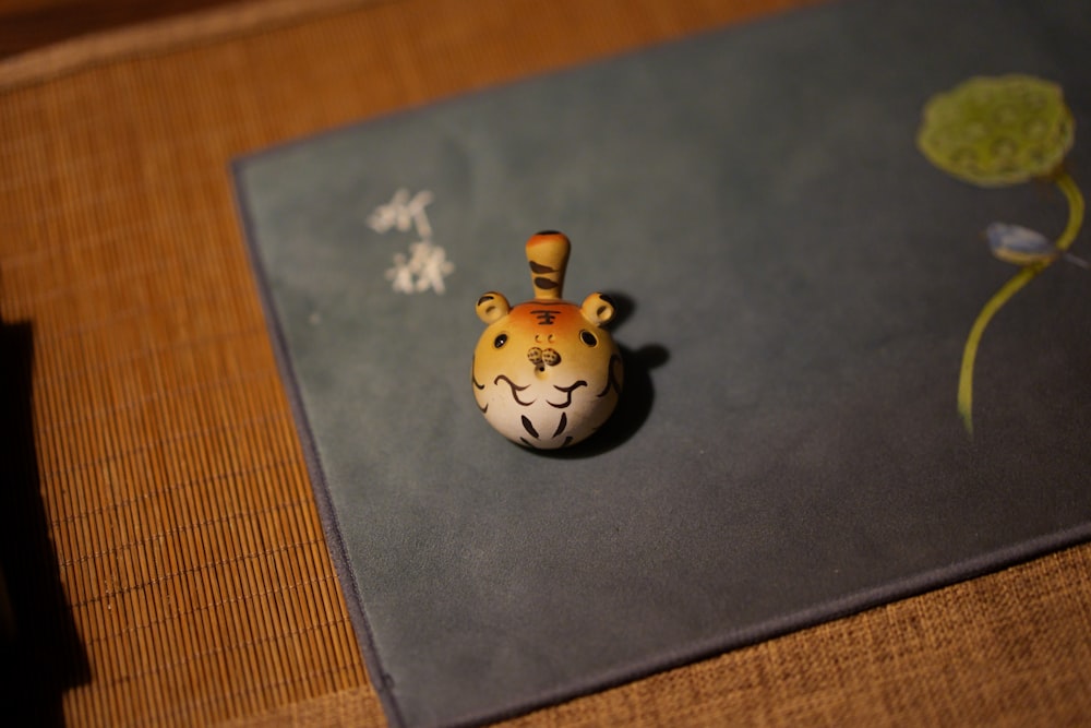 a close up of a small animal on a table