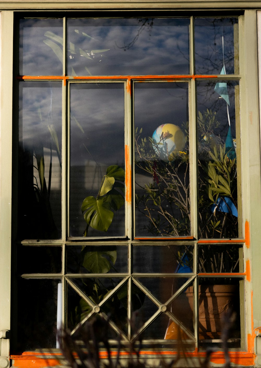 a view of a full moon through a window