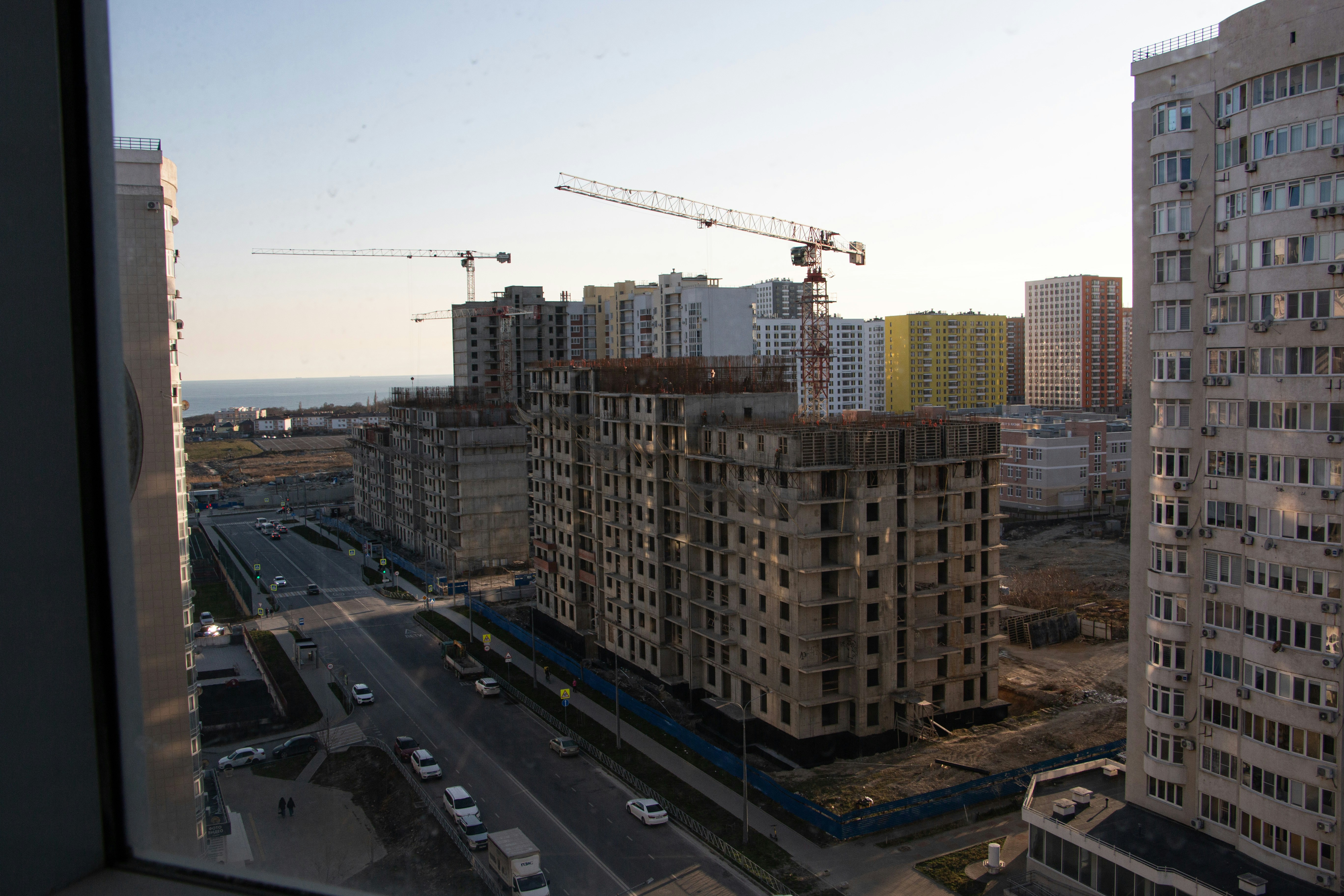A view of a construction site from a window photo – Free Building Image ...
