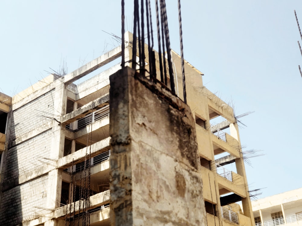 a very tall building with a bunch of wires on top of it