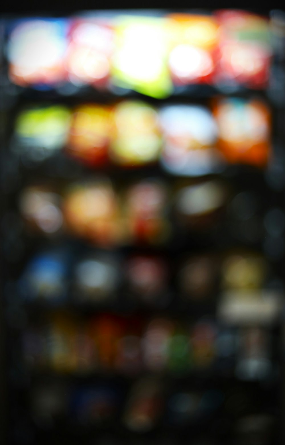 a blurry photo of a vending machine