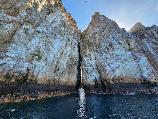 A large rock outcropping next to a body of water — Galápagos Islands, Ecuador