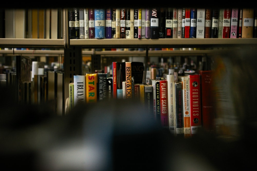 a blurry photo of a bookshelf full of books