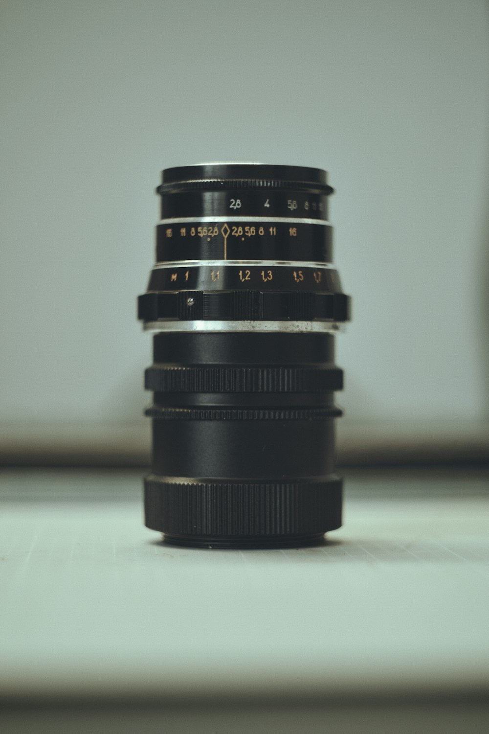 a close up of a camera lens on a table