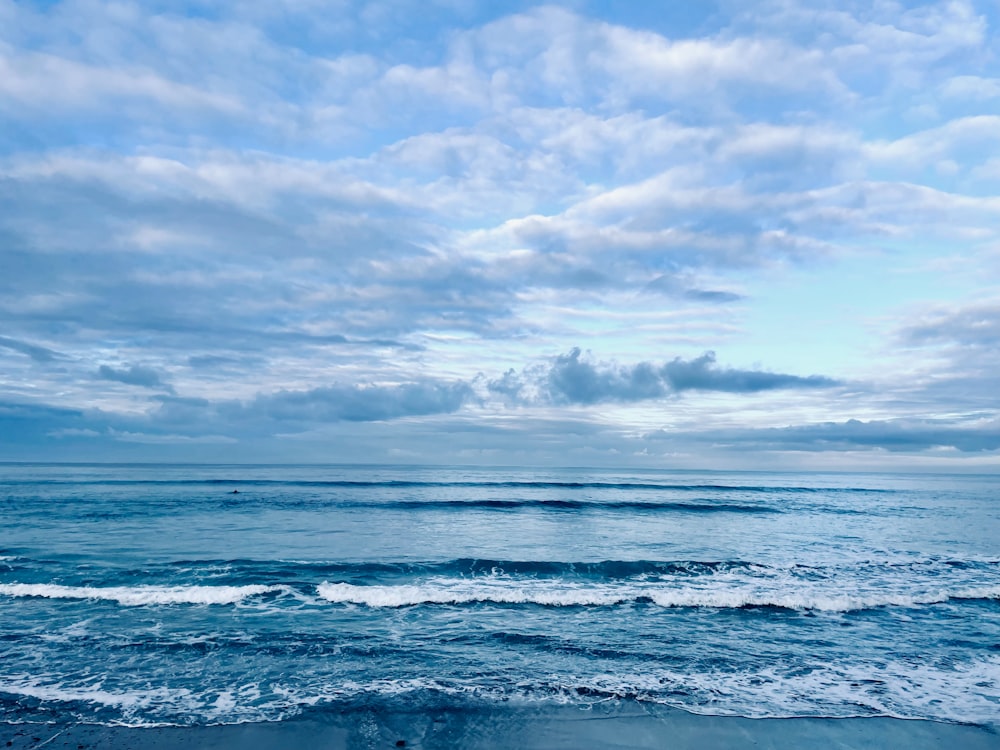 a view of the ocean from a beach