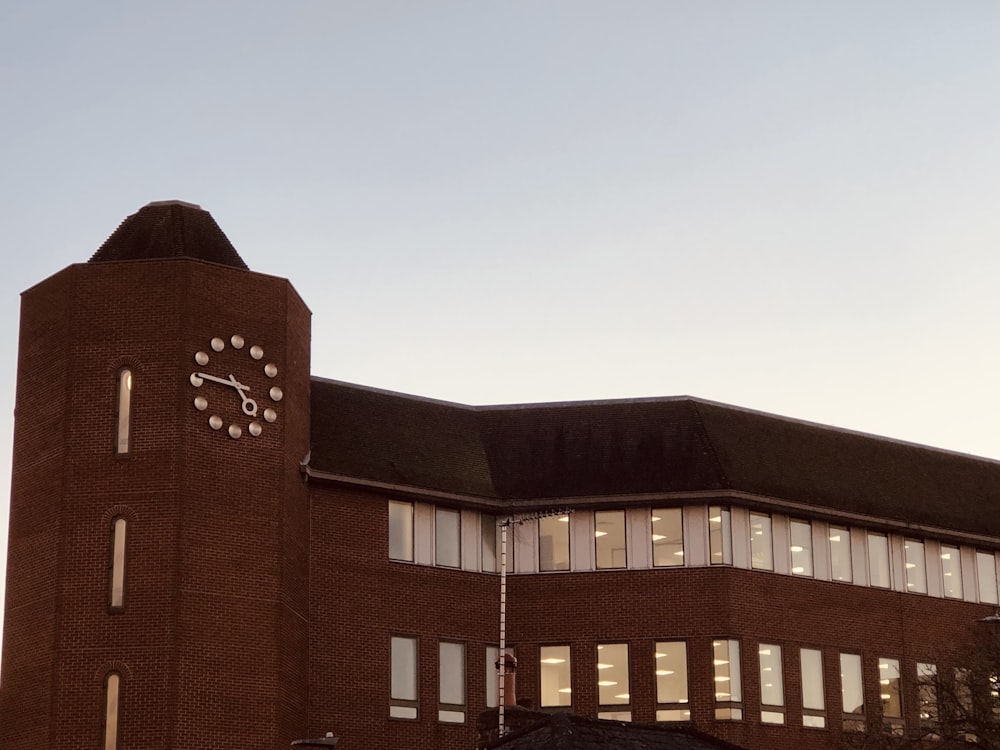 a large building with a clock on the side of it