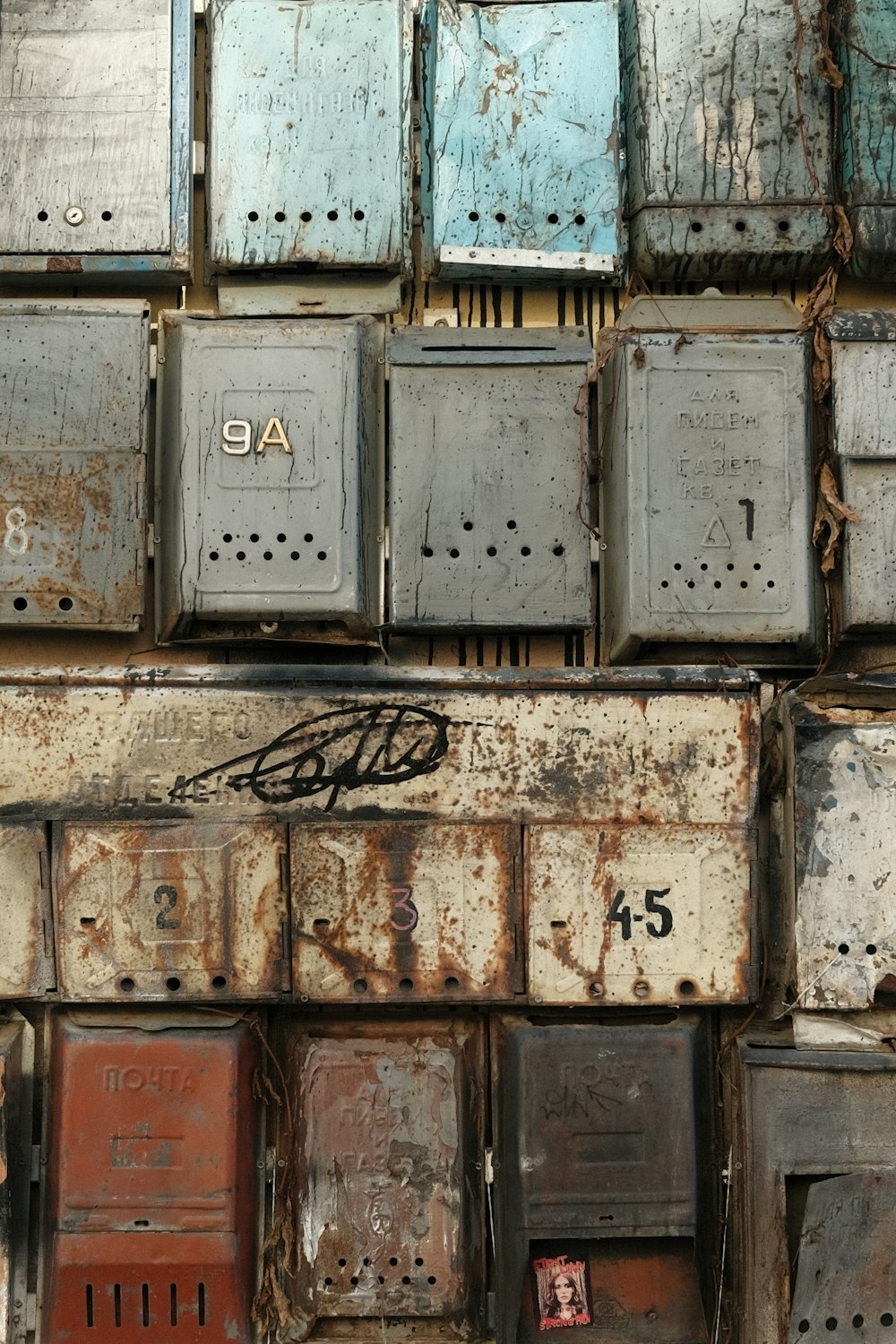 a bunch of boxes that are sitting on a wall