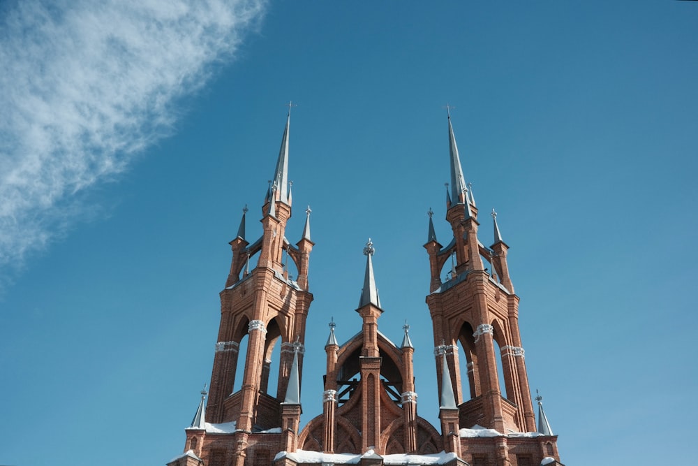 a very tall building with a clock on it's side