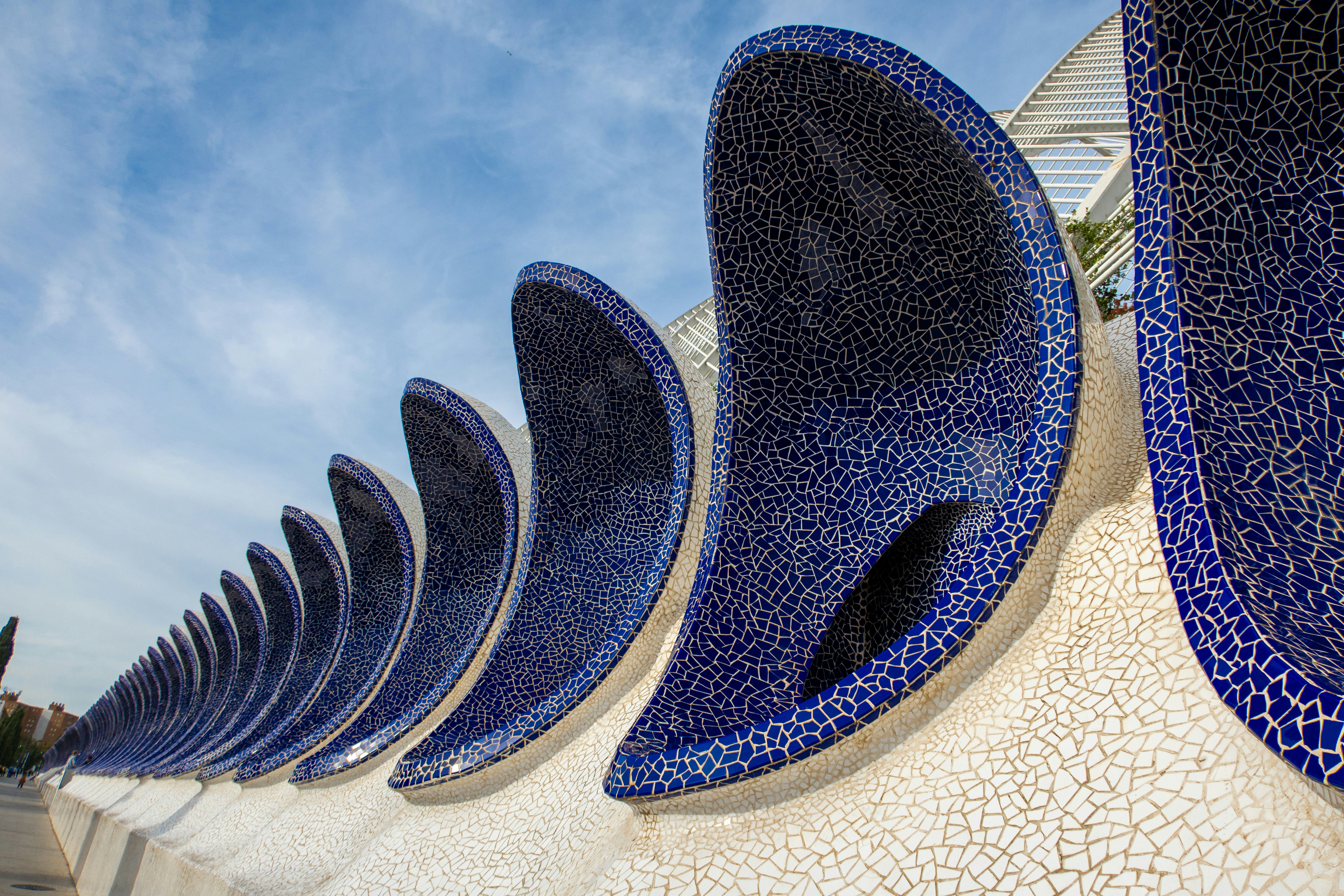 a row of blue and white vases sitting next to each other