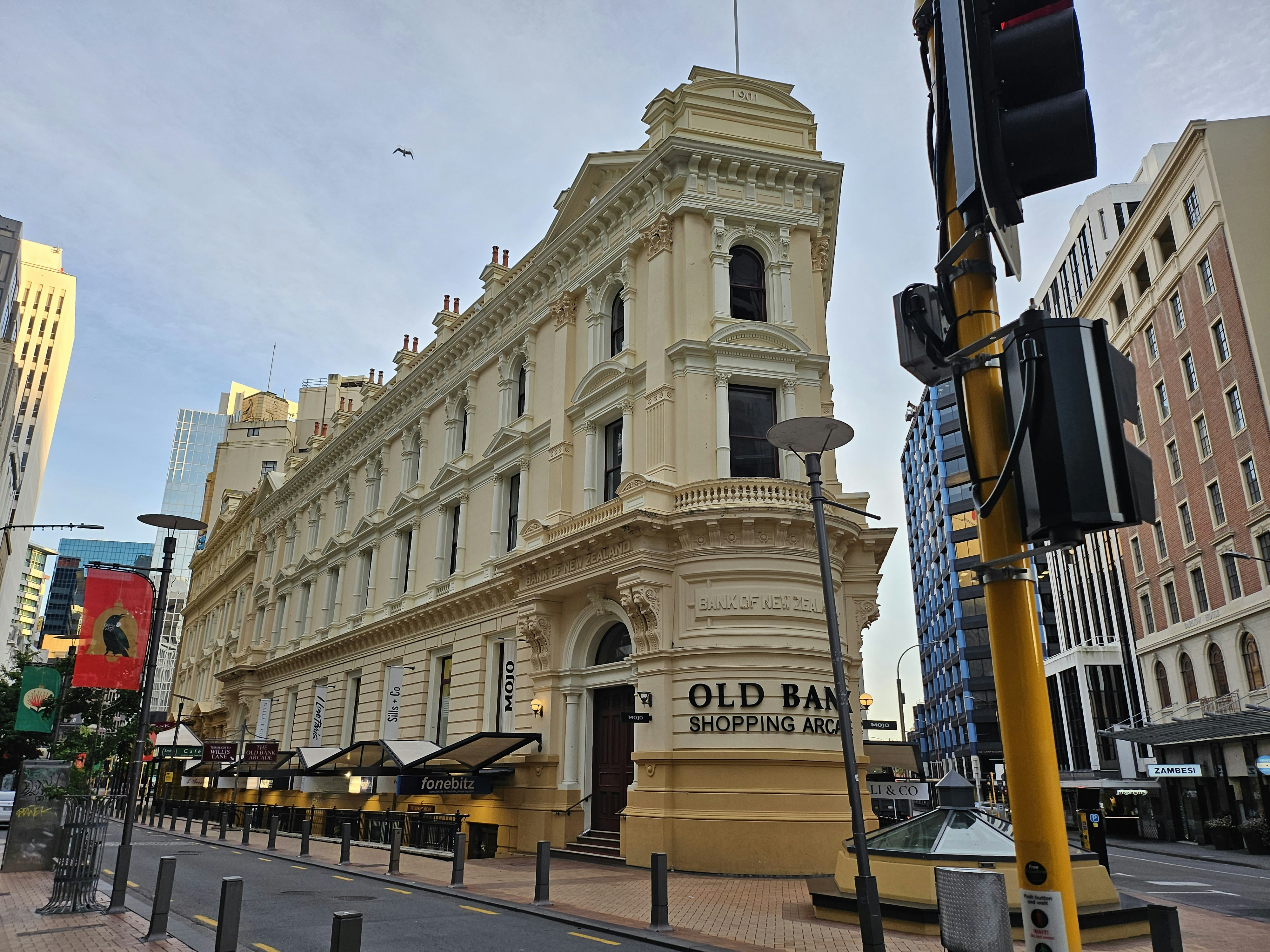 an old bank building on a city street