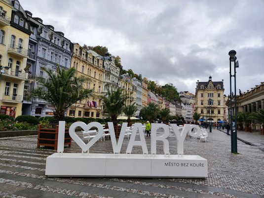 A sign that says i love varry in front of a row of buildings — Karlovy Vary, Czech Republic