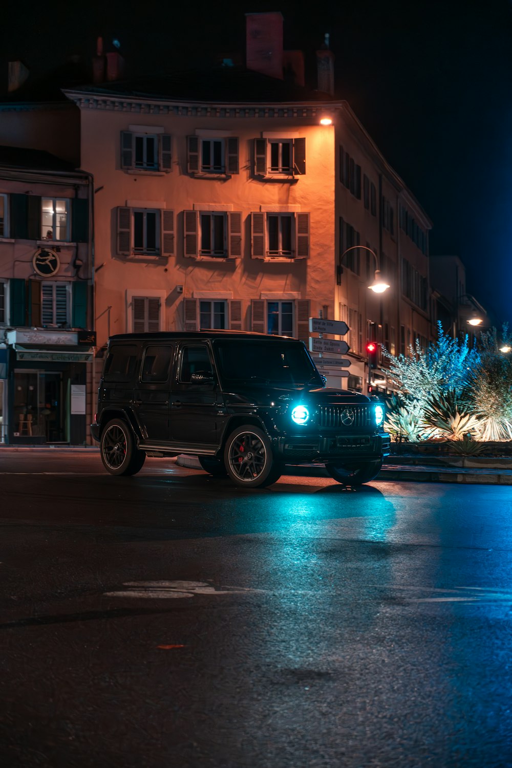 a black jeep parked on the side of the road