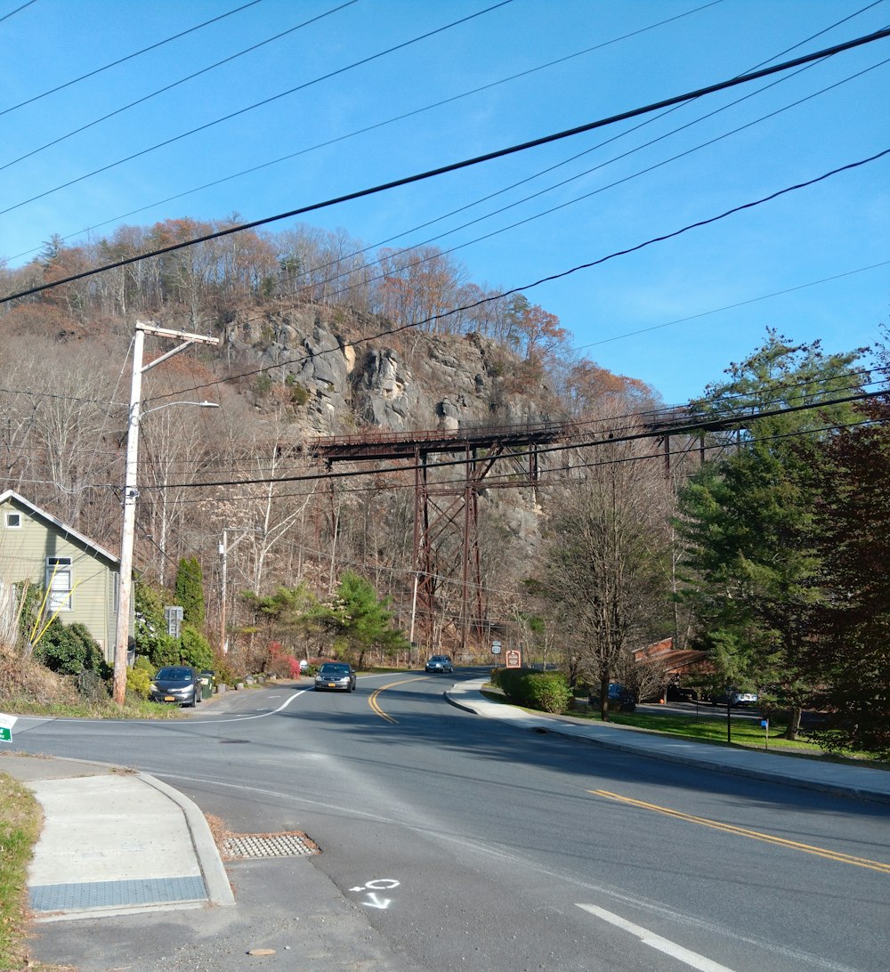 a street with a mountain in the background