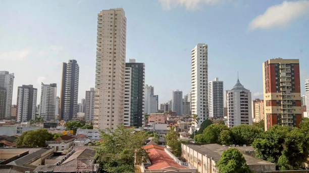 a view of a city with tall buildings