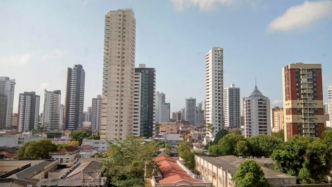 a view of a city with tall buildings