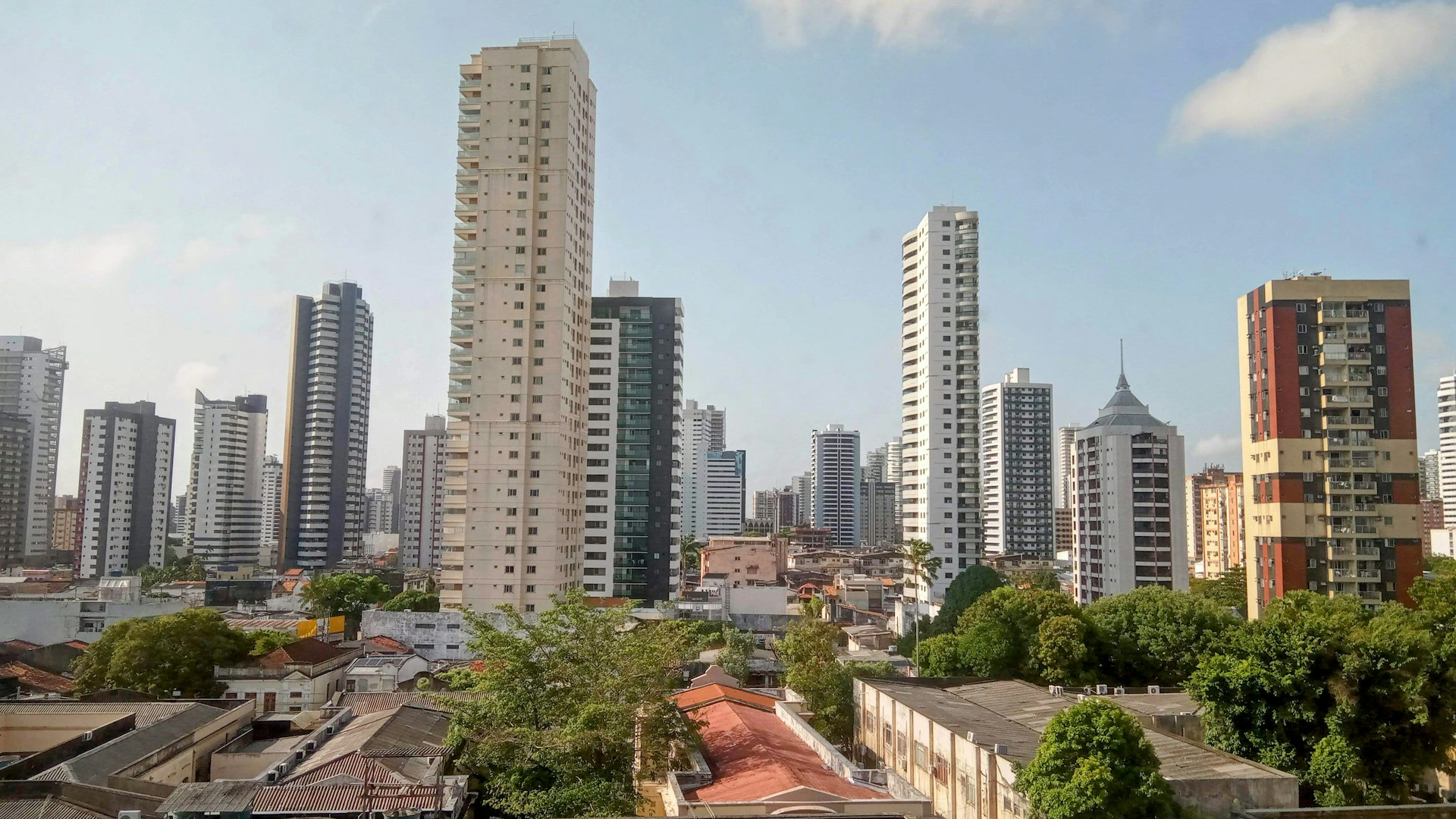 a view of a city with tall buildings